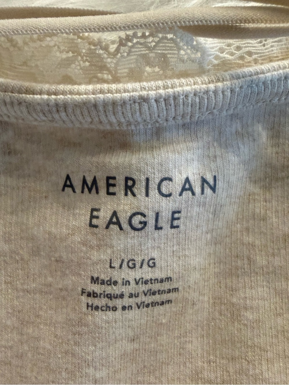 🦅 AMERICAN EAGLE
Oatmeal Heathered Ribbed Cami Strappy back - size L 🦅